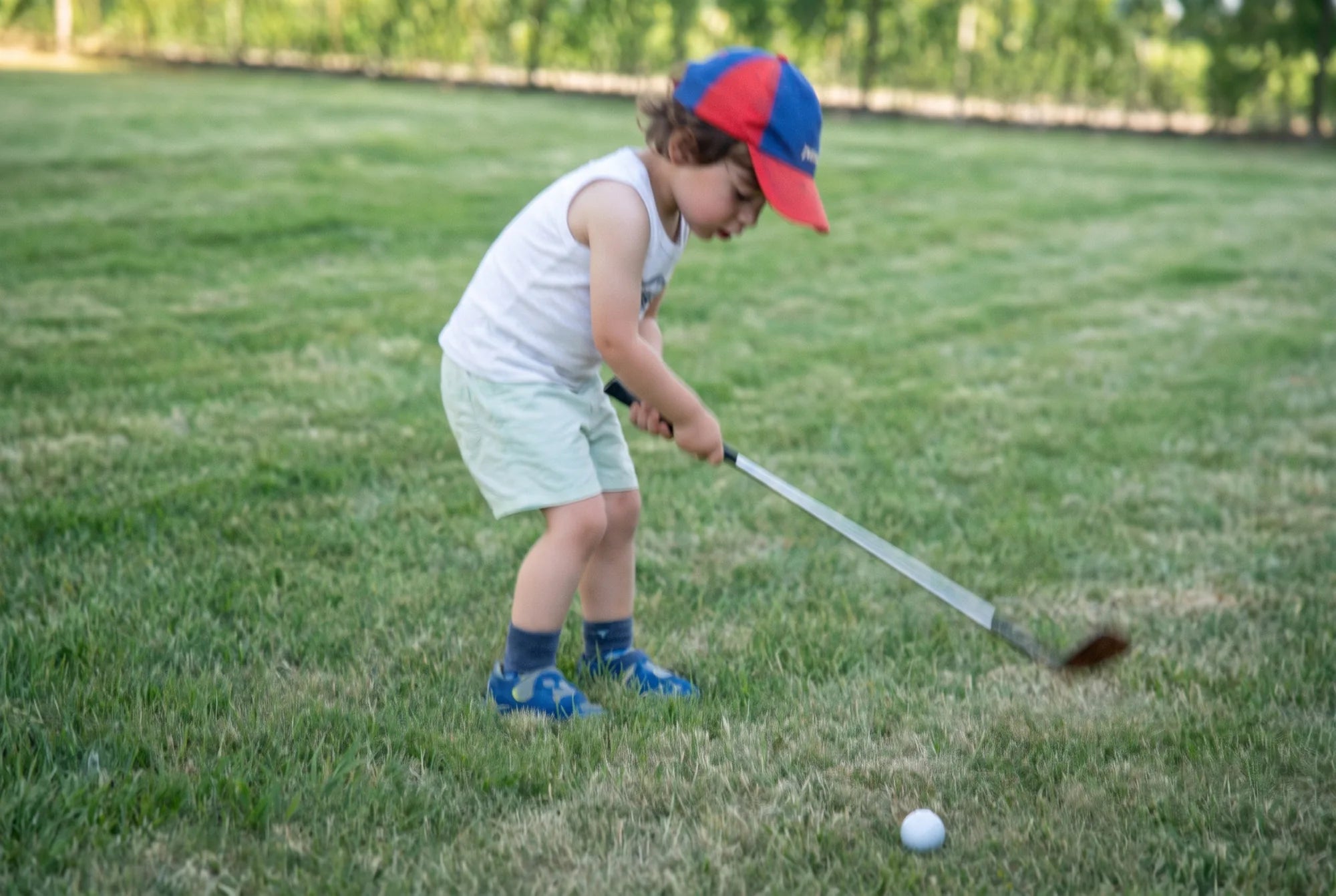 KADI founder William as a child playing golf in Crans-Montana